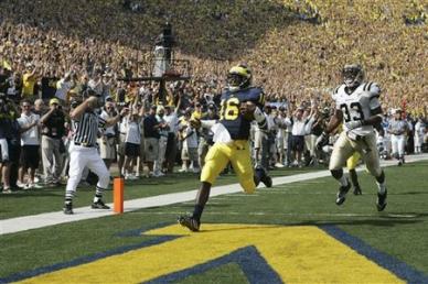 NCAA: Could Pitt become a player for Michigan's Denard Robinson? 